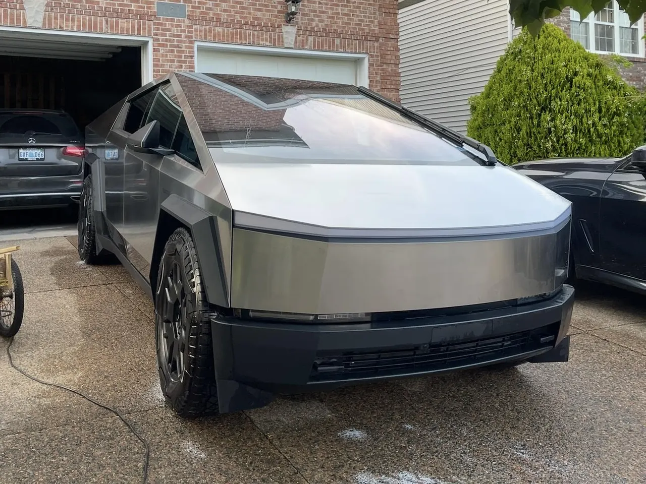 A Tesla Cybertruck on a driveway